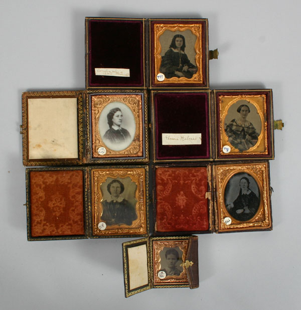 Appraisal: Six early photographs in various leather cases one ambrotype one