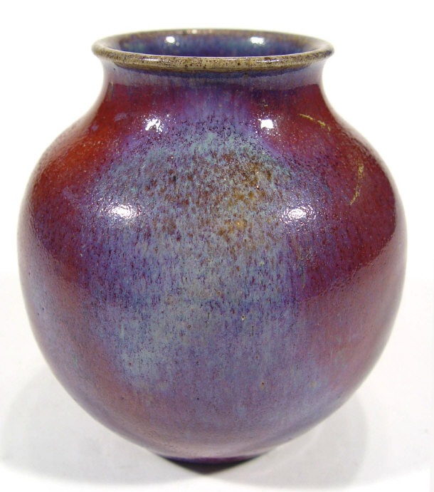 Appraisal: English Art pottery vase decorated with a purple Flambe glaze