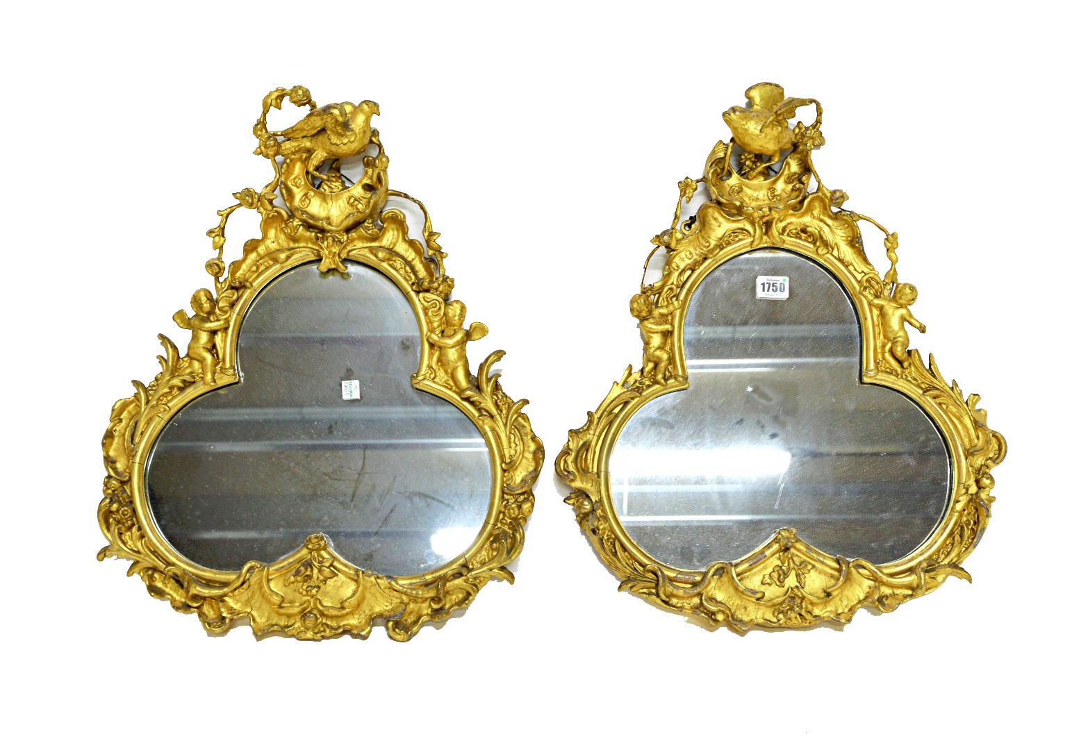 Appraisal: A pair of th century gilt framed wall mirrors each