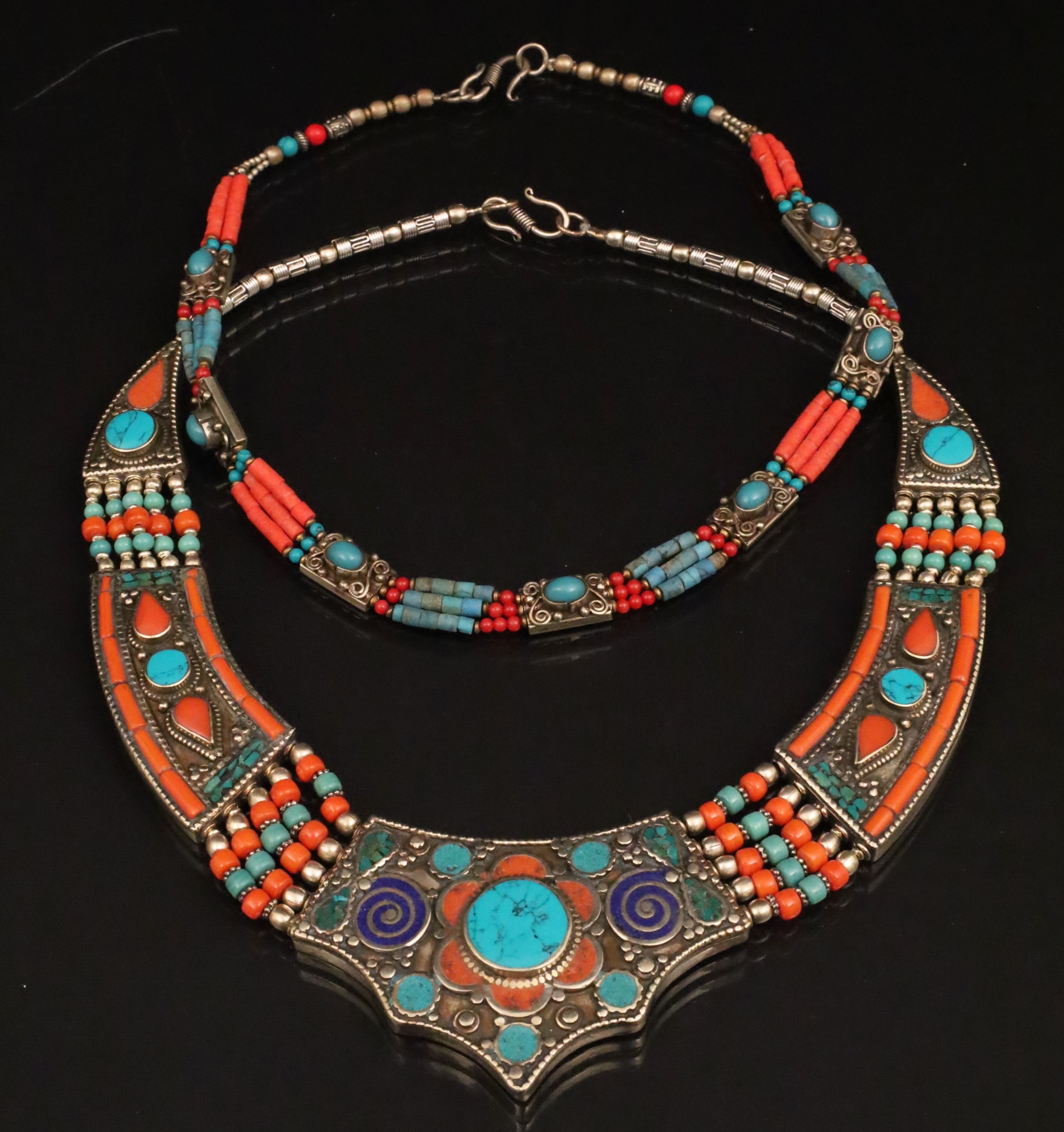 Appraisal: SILVER NECKLACES WITH TURQUOISE AND CORAL Group of two necklaces