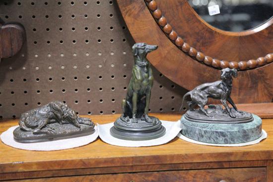 Appraisal: THREE BRONZE DOG SCULPTURES European late th or early th