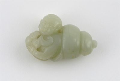 Appraisal: A small celadon jade carving of a small boy emerging