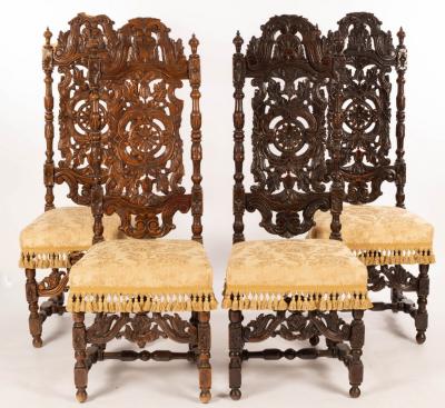 Appraisal: Four th Century style oak hall chairs with profusely carved