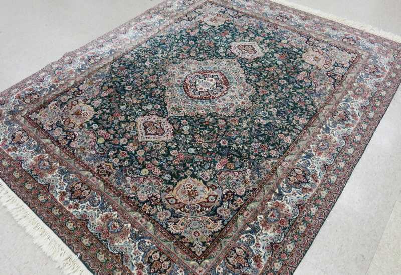 Appraisal: CONTEMPORARY PERSIAN CARPET floral and central floral medallion design on