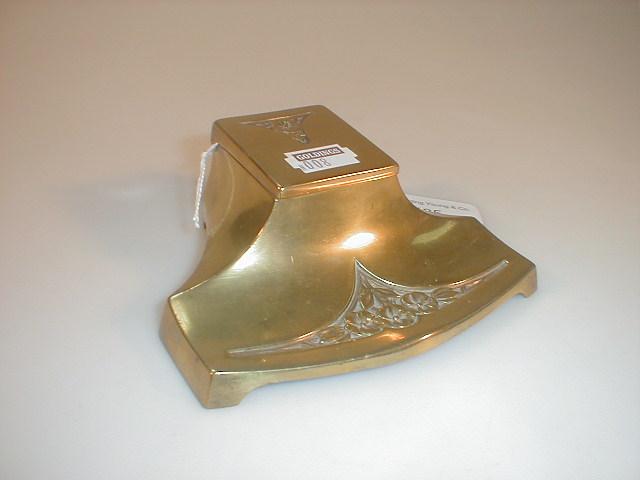 Appraisal: A German brass inkstand embossed with flowers the hinged cover