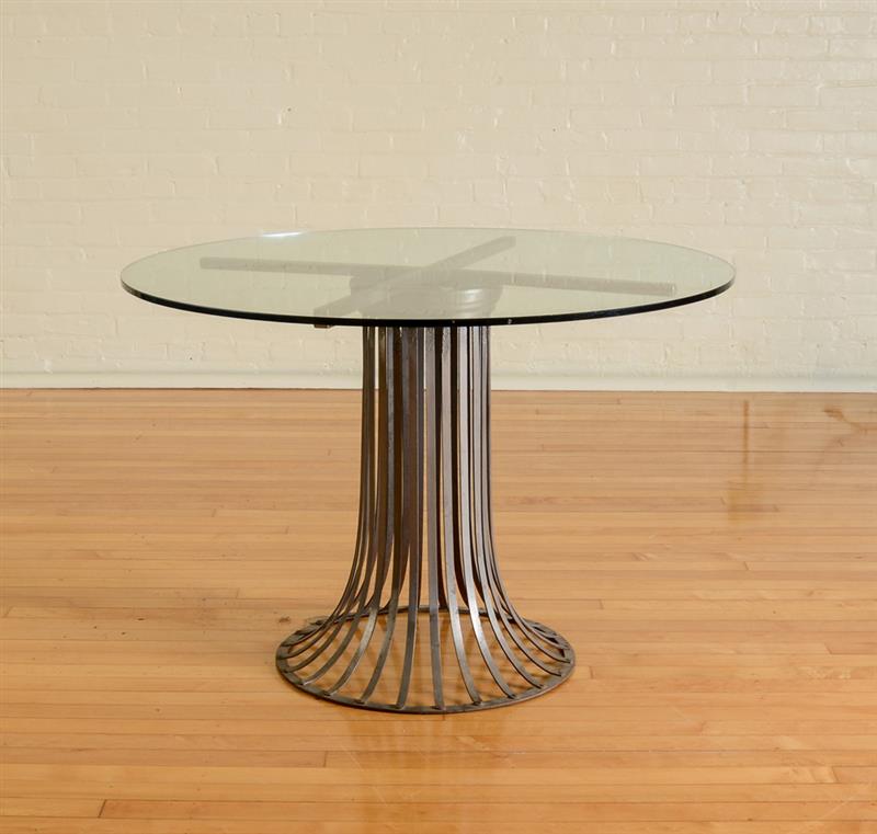 Appraisal: CONTEMPORARY METAL AND GLASS CENTER TABLE The circular glass top