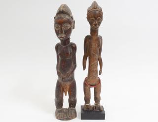 Appraisal: TWO CARVED TRIBAL BAULE FIGURES Bouake Of a female wearing