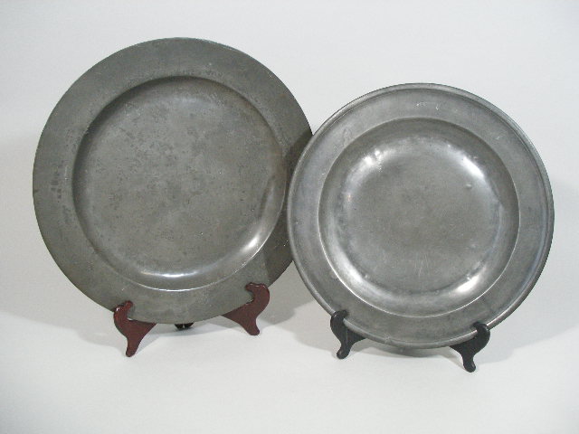 Appraisal: Two Large Antique Pewter Chargers two unmarked early pewter chargers