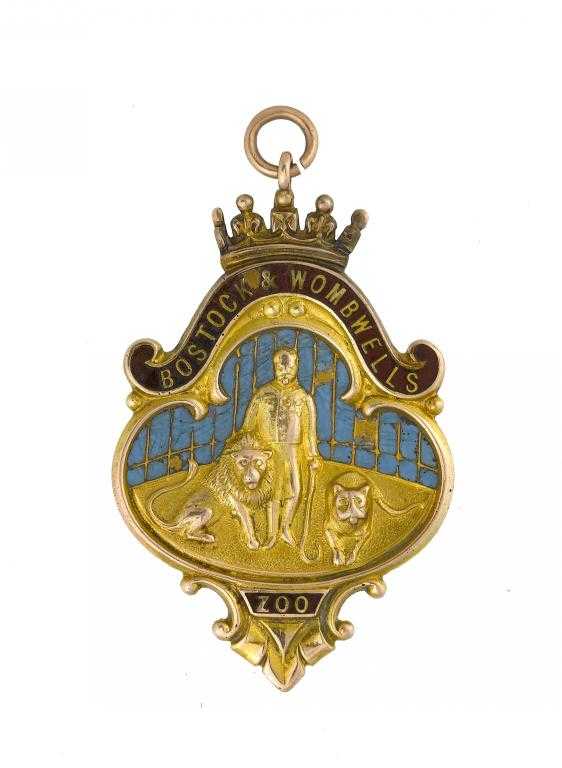 Appraisal: AN UNUSUAL CT GOLD AND ENAMEL WATCH FOB SHIELD OF