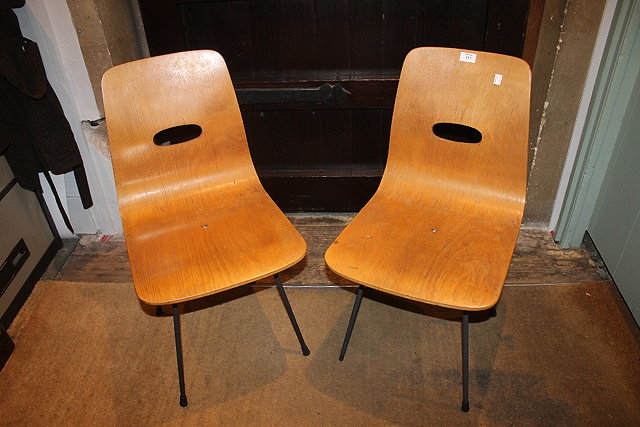 Appraisal: A PAIR OF ROBIN DAY Q STAK CHAIRS with shaped