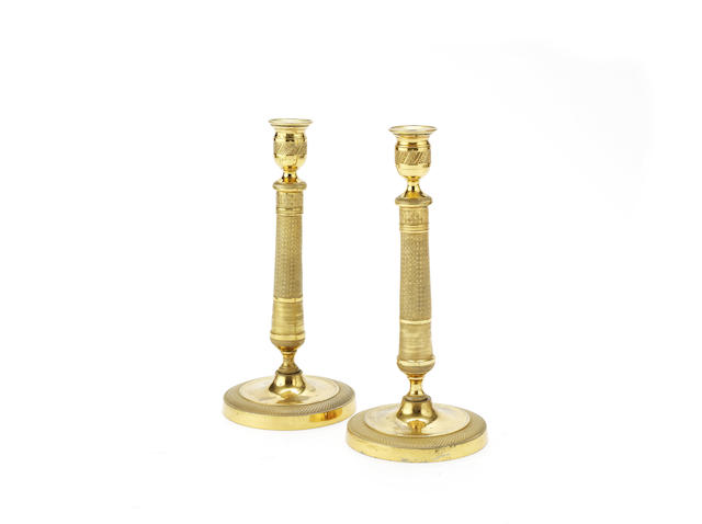 Appraisal: A pair of th century Empire style gilt bronze candlesticks