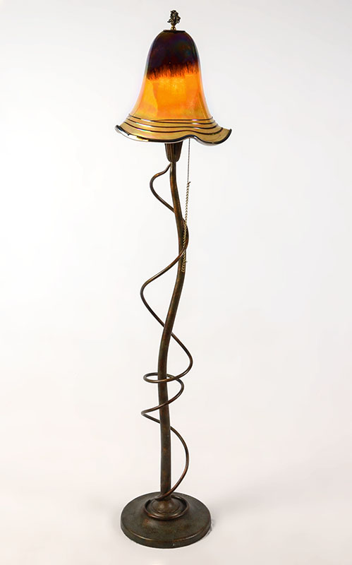 Appraisal: QUOIZEL FLOOR LAMP WITH TODD PHILLIPS GLASS SHADE Patinated mixed