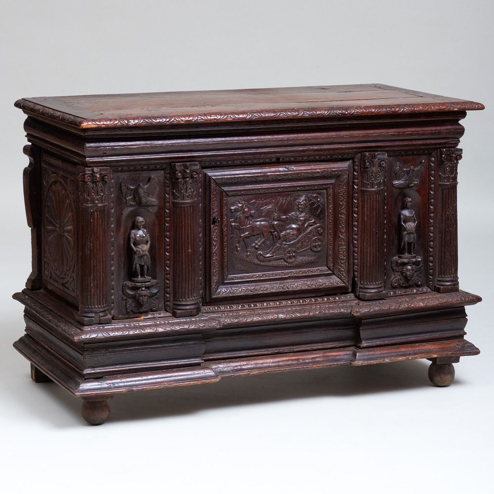 Appraisal: Continental Baroque Style Carved Oak Chest The hinged top opening