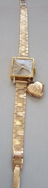 Appraisal: A lady's ct gold square cased Longines wristwatch with a