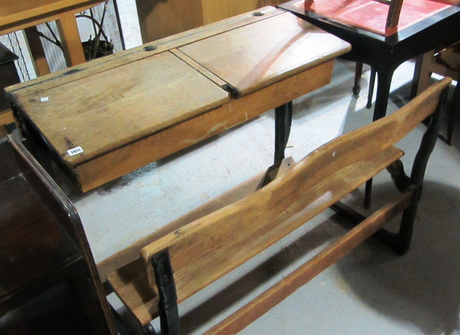 Appraisal: An early th century oak school desk