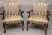 Appraisal: A Lovely Pair of Ornately Carved Armchairs A wonderful pair