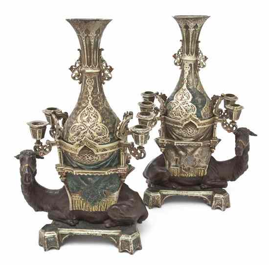 Appraisal: A Pair of Continental Cold Painted Figural Centerpieces cast as