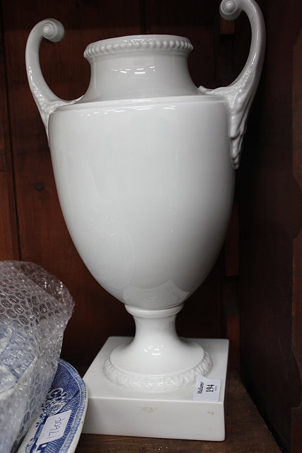 Appraisal: FURSTENBERG WHITE CERAMIC TWO HANDLED VASE of classical urn form