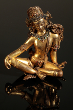 Appraisal: A SINO-TIBETAN GILT BRONZE FIGURE OF INDRA Early Ming or