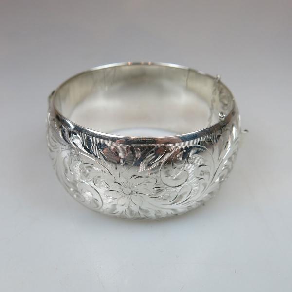 Appraisal: Forstner Sterling Silver Hinged Bangle with engraved decoration cm width