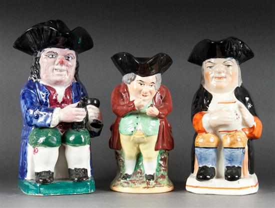 Appraisal: Three Staffordshire toby jugs th century ''Snuff Taker'' - in