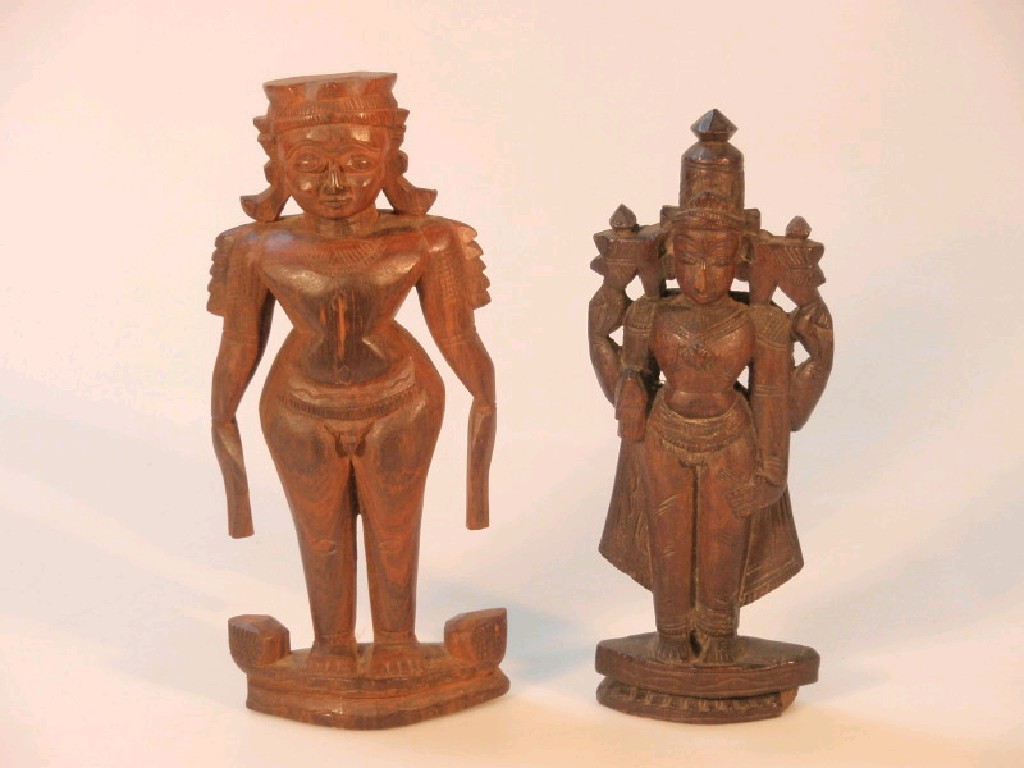 Appraisal: Two Asian carved wooden figures cm and cm