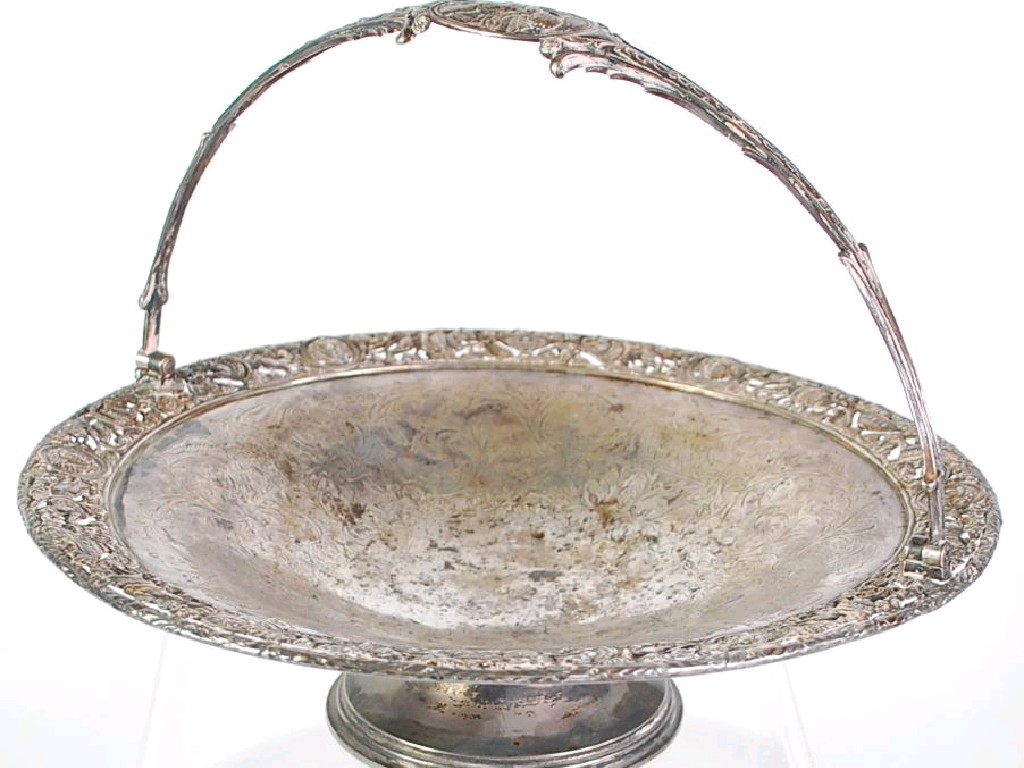 Appraisal: GOOD VICTORIAN PIERCED AND ENGRAVED SILVER SWING HANDLED CAKE BASKET