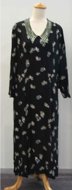 Appraisal: Afternoon dress in abstract printed navy crepe with tricot collar