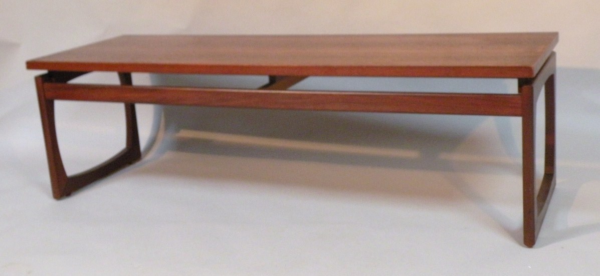 Appraisal: A 's G-plan coffee table with a rectangular top raised