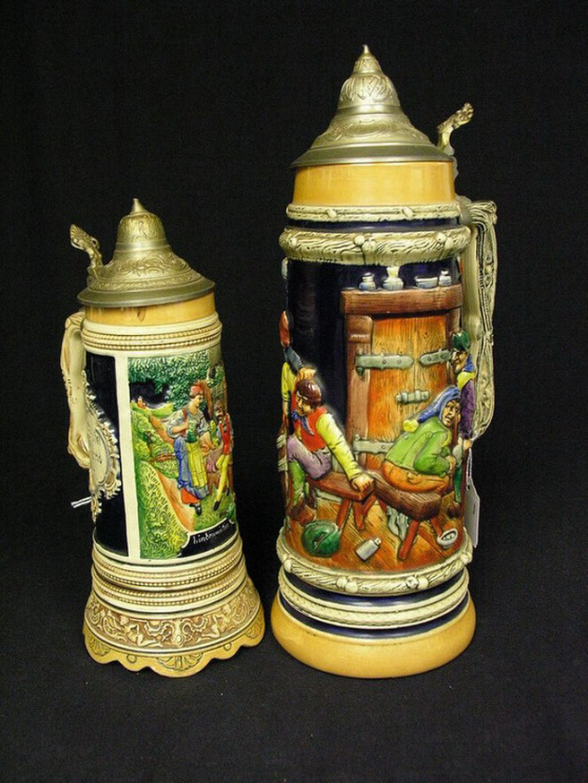 Appraisal: PAIR GERMAN STEINS One musical and