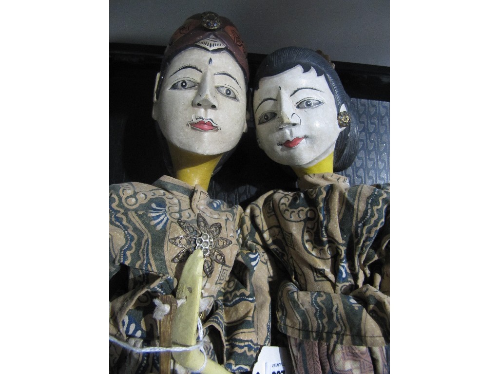 Appraisal: Lot comprising two Eastern puppets