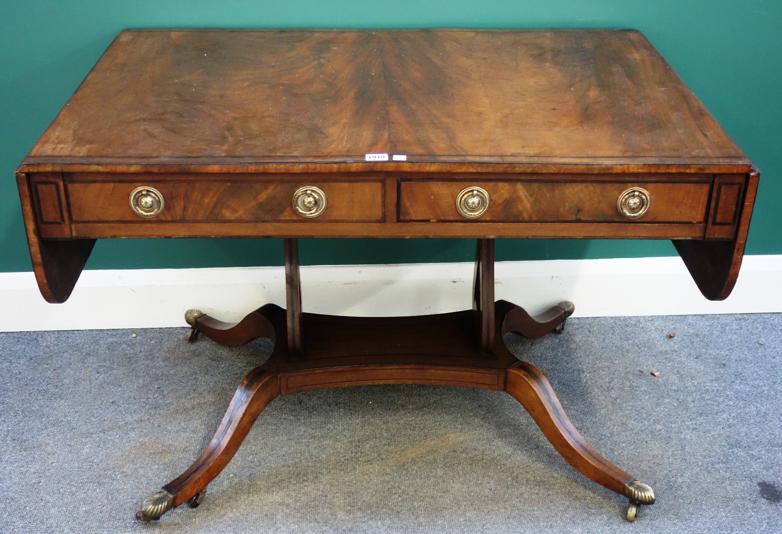 Appraisal: A George III inlaid mahogany sofa table with pair of