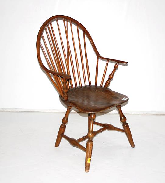 Appraisal: A continuous arm Windsor chair New England late th early