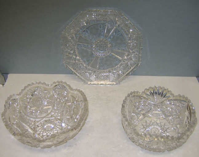 Appraisal: THREE CUT GLASS SERVING ITEMS Two fruit bowls and octagonal