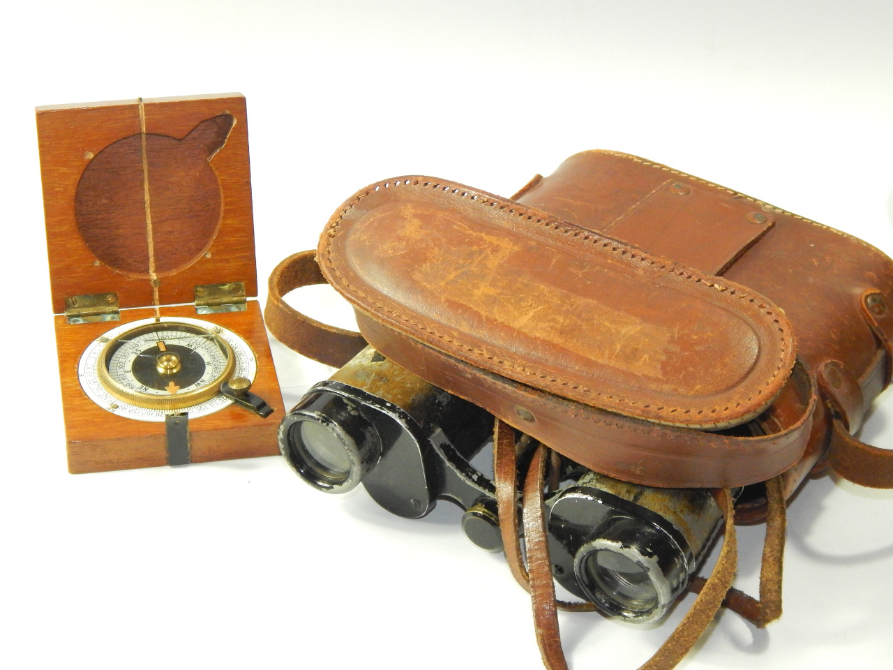 Appraisal: A WWI compass F Barker Sons London cased together with