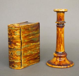 Appraisal: Rockingham candlestick and flask A th century Flint glazed book