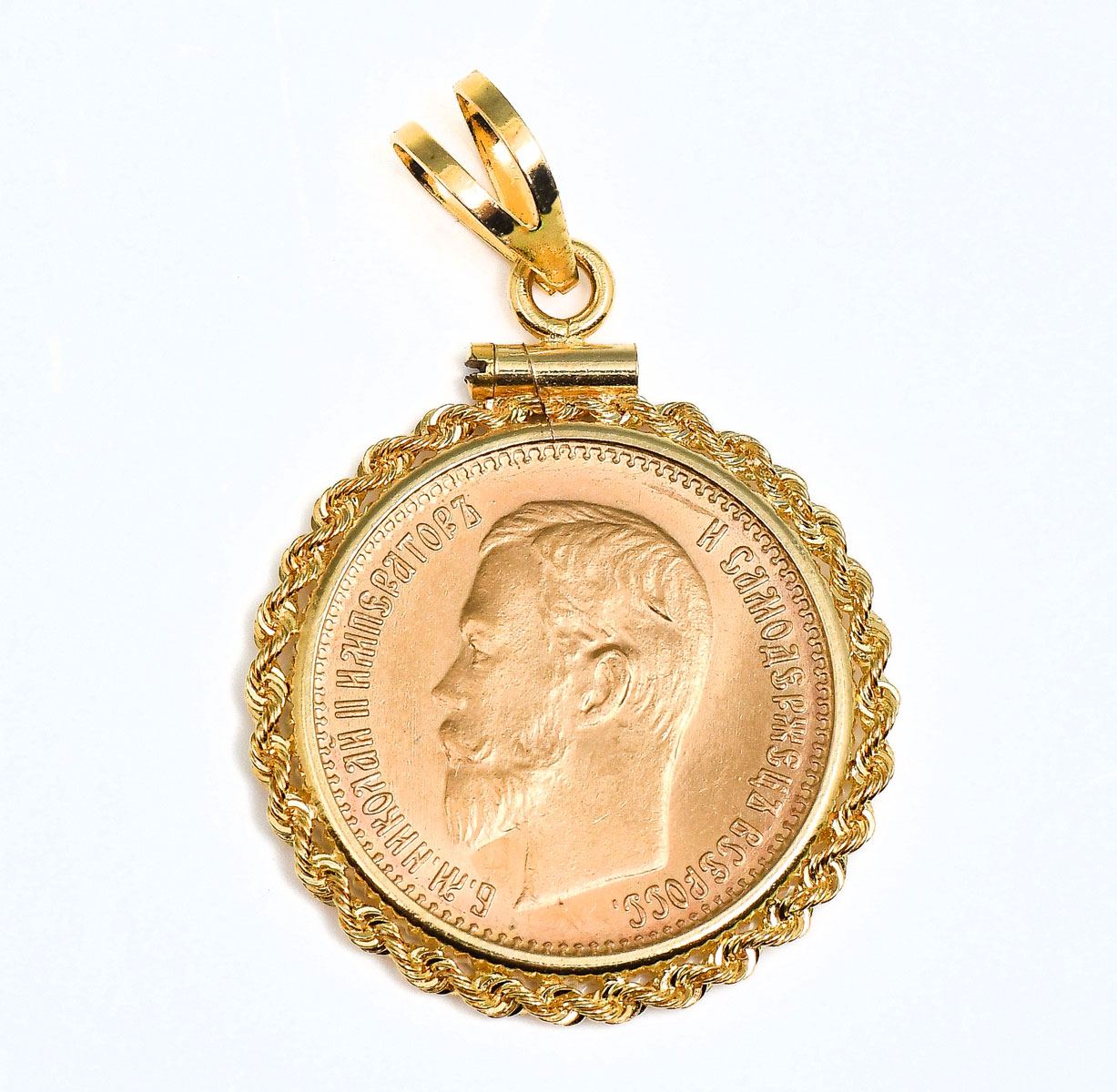 Appraisal: ROUBLE GOLD COIN IN K BEZEL This gold Russian rouble