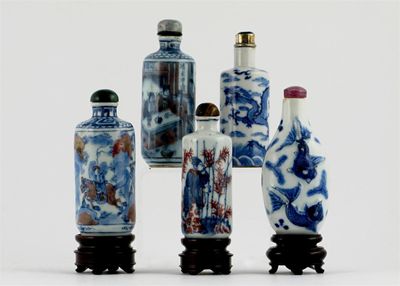 Appraisal: Five Chinese porcelain snuff bottles and stoppers three in underglaze