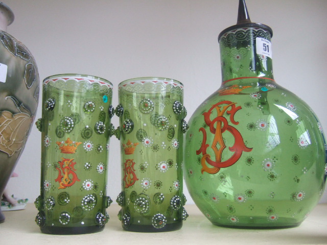 Appraisal: A German enamelled green glass flask with hinged metal cover