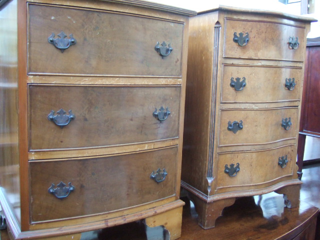 Appraisal: A th century walnut serpentine small chest of four long