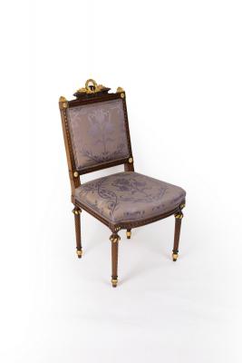 Appraisal: An Empire style chair with wreaths and ribbon tie surmount