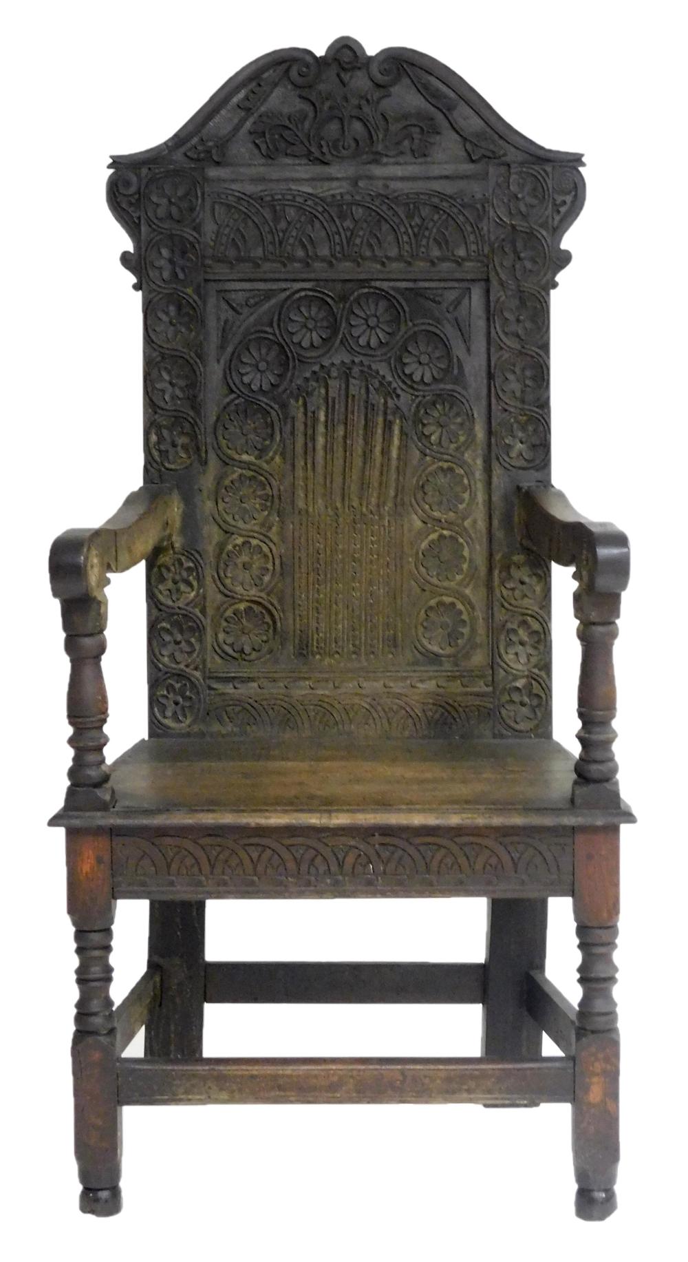 Appraisal: Wainscot Armchair English th C carved oak with arched tablet