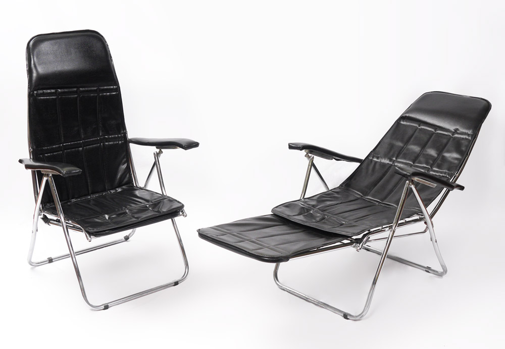 Appraisal: PAIR MOD METALFAR ITALIAN FOLDING CHAIRS Chrome tubular frame black