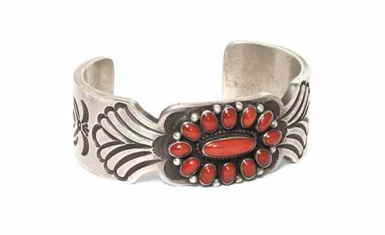 Appraisal: A Navajo Sterling Silver and Coral Cluster Cuff Bracelet Ernest