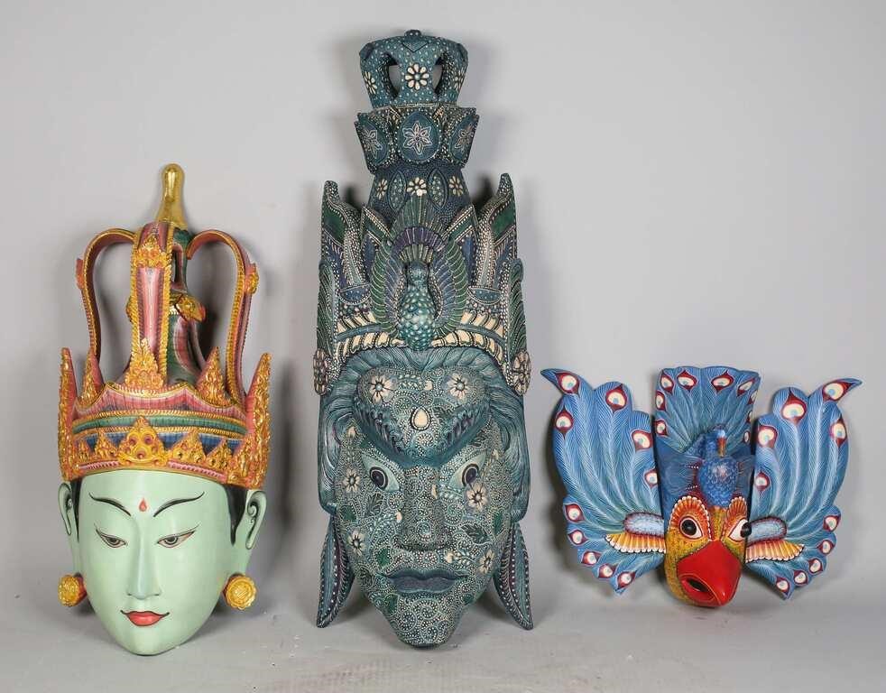 Appraisal: Balinese wood masks hand painted Chip to dotwork mask Largest