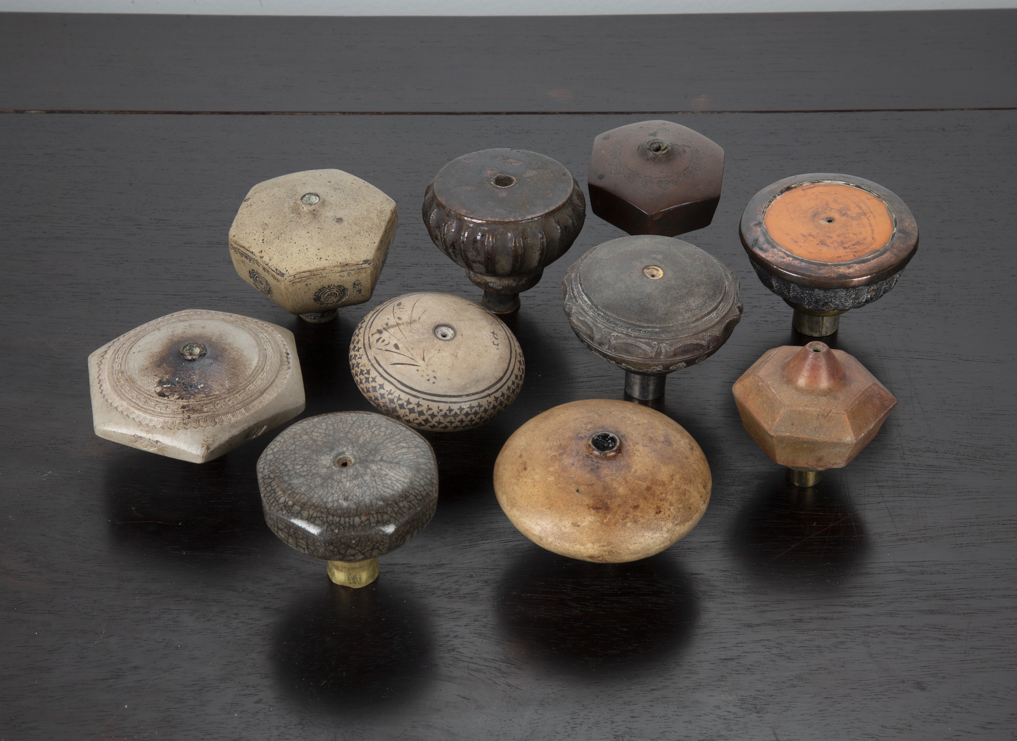 Appraisal: Ten opium pipe bowlsChinese circa including engraved earthenware and other