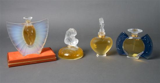 Appraisal: A Collection of Four Lalique Perfume Bottles Height of tallest