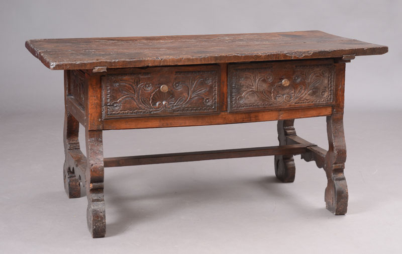 Appraisal: SPANISH BAROQUE CARVED AND STAINED OAK TRESTLE TABLE The rectangular