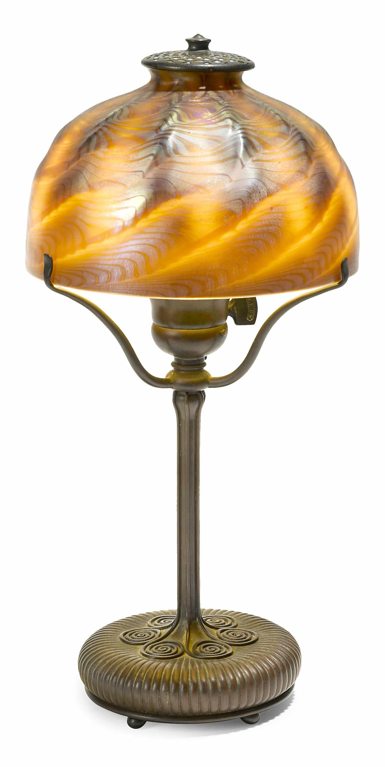 Appraisal: A Tiffany Studios Favrile glass and bronze table lamp -