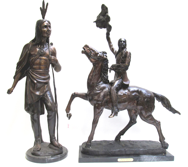 Appraisal: TWO CAST BRONZE FIGURAL SCULPTURES of a First Nation person